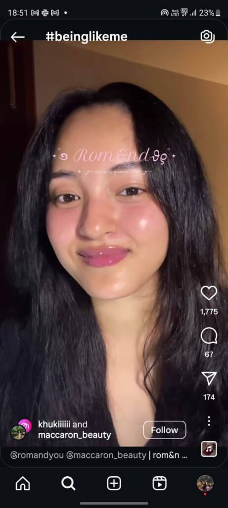 Khukiii applying Rom&nd lip tint, achieving a bold, glossy finish perfect for everyday K-beauty style.