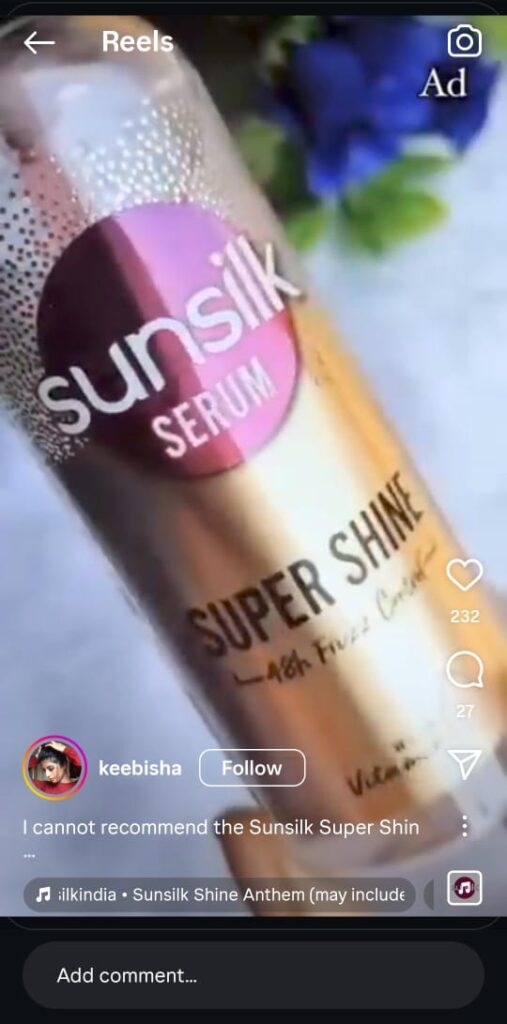 Keebisha runs her fingers through shiny hair, emphasizing a frizz-free finish with minimal effort.