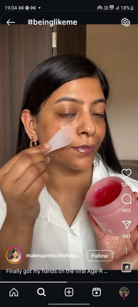 MakeupMischiefsby reviewing the Age-R mask, showcasing its toning and firming effects with a spa-at-home vibe.